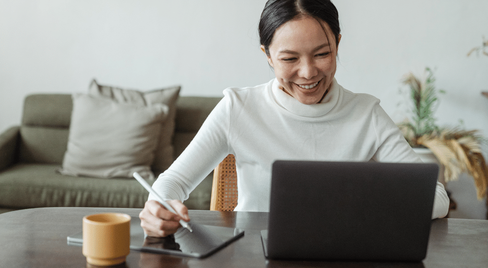 Woman studying on laptop
